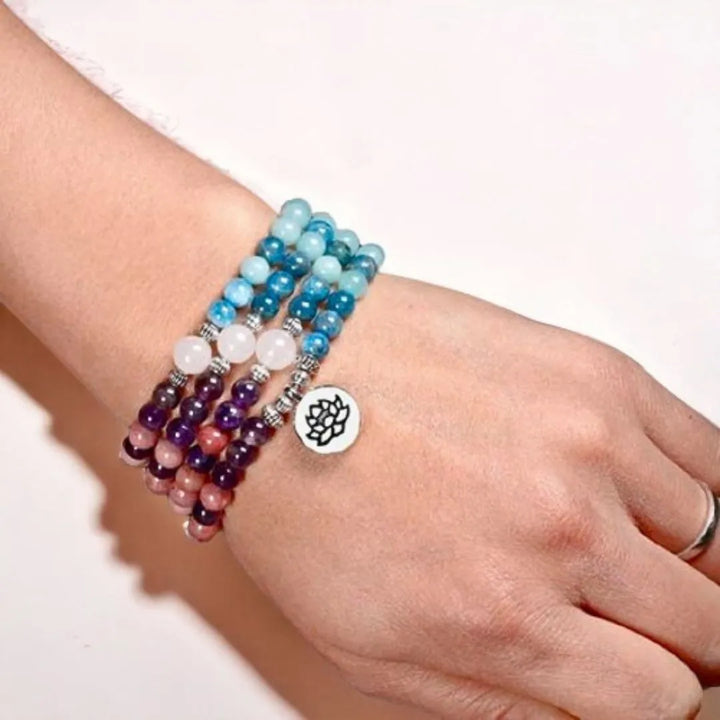 Pulseira Feminina Japamala com 108 contas para meditação e prática de hoponopono, ideal para redução de estresse.